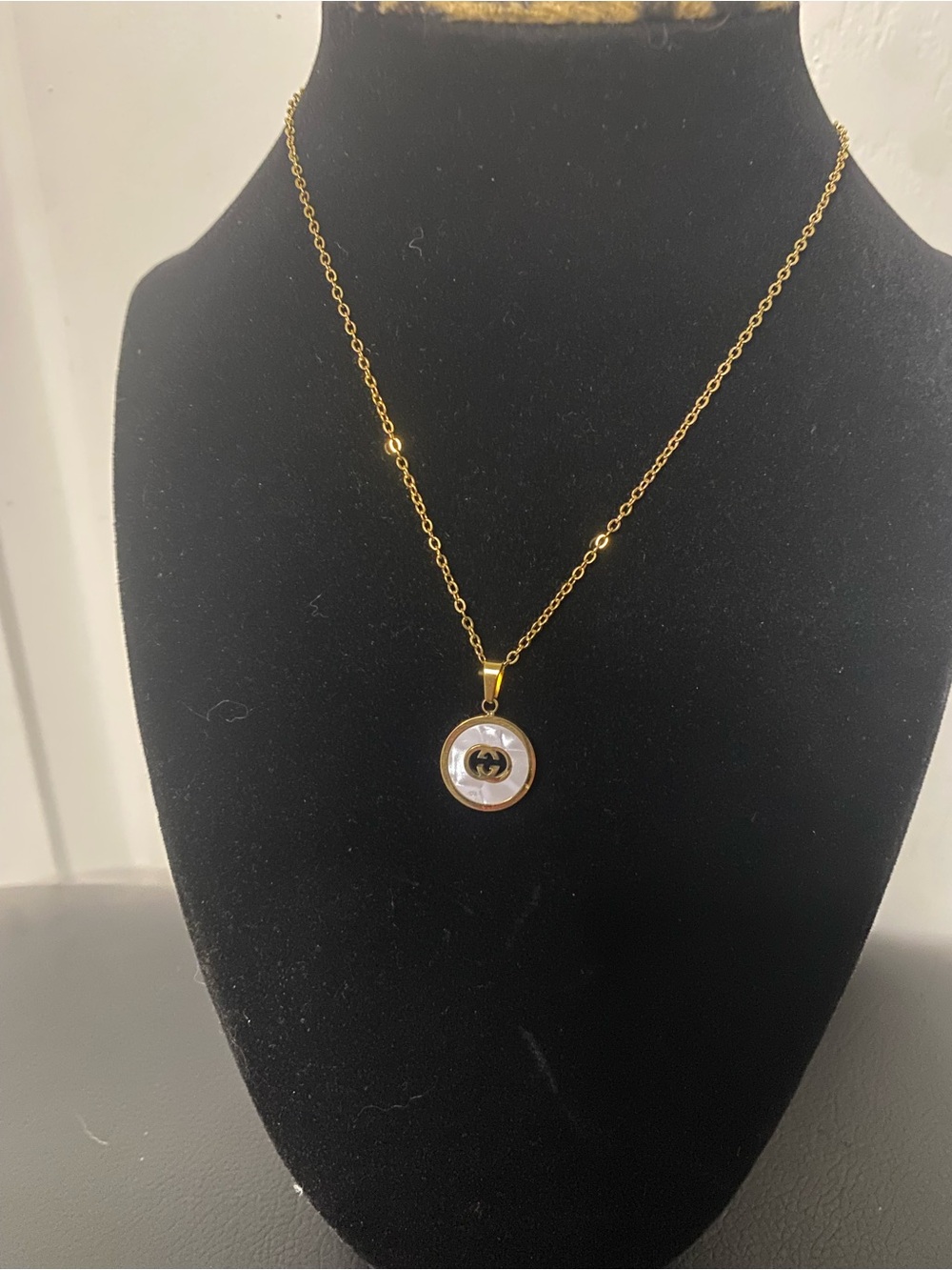 Gold-Tone Round GG Pendant Necklace with Mother-of-Pearl Accent Stainless Steel